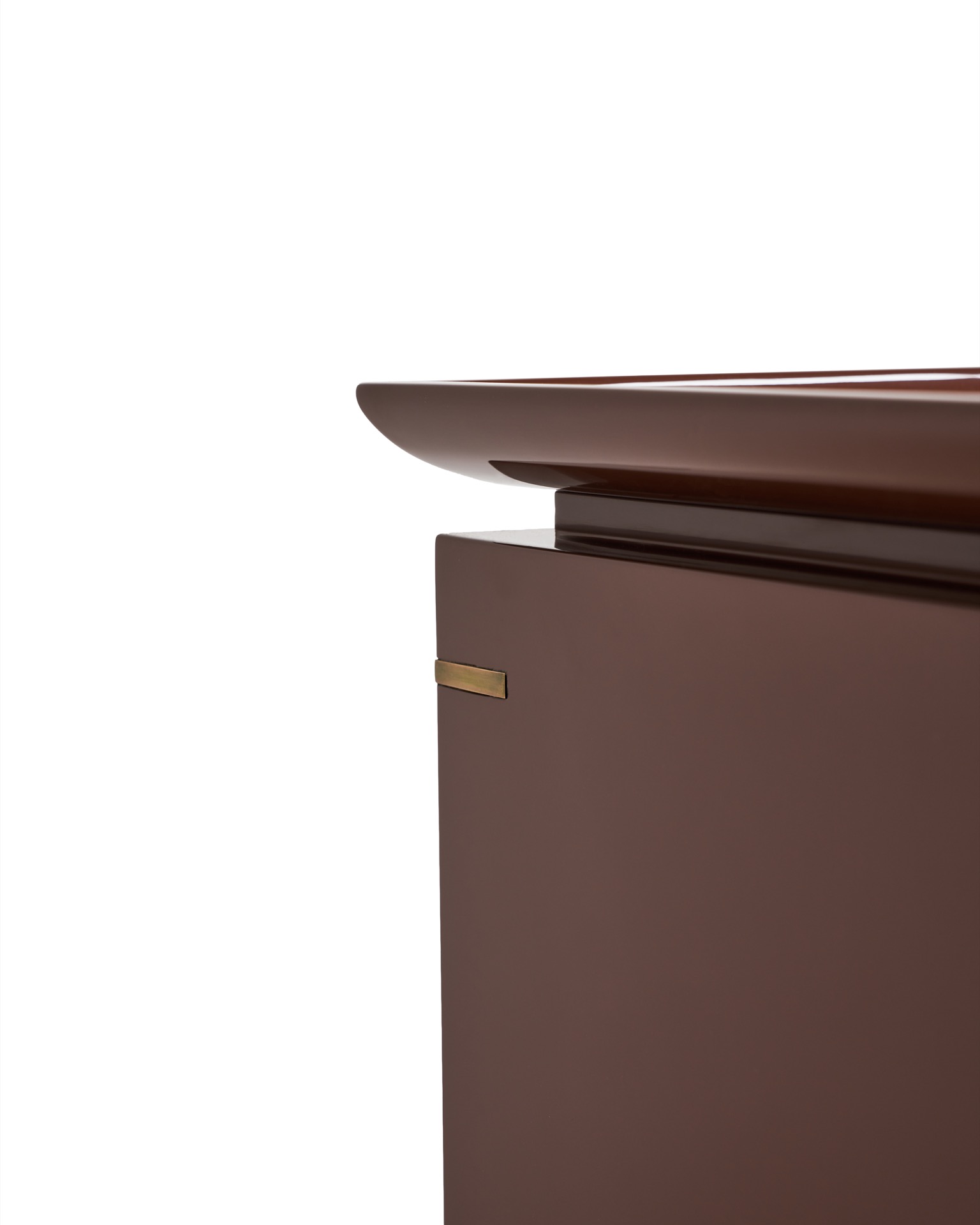 Modern solid color side table with brass accents