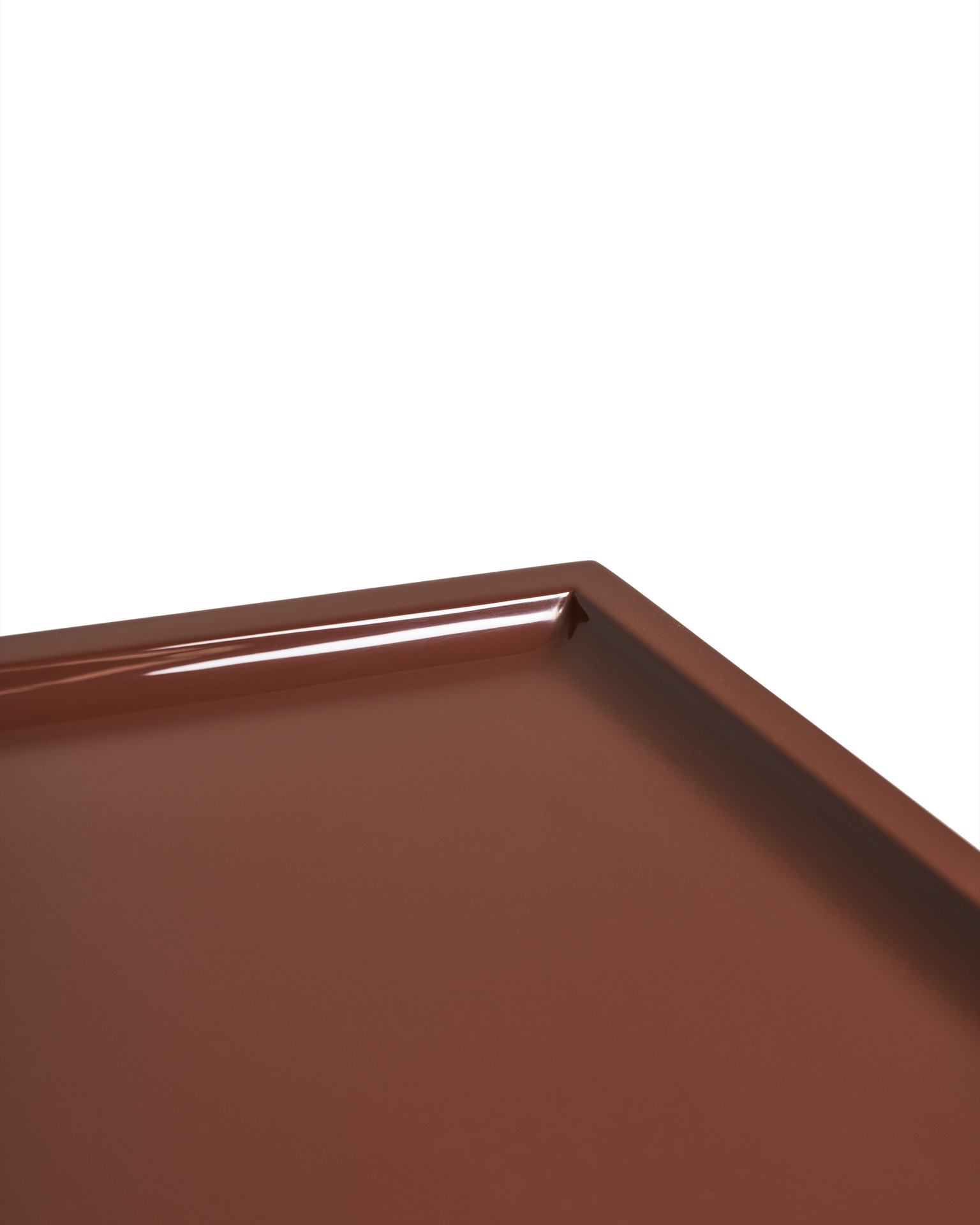 Minimalist accent table in solid color.