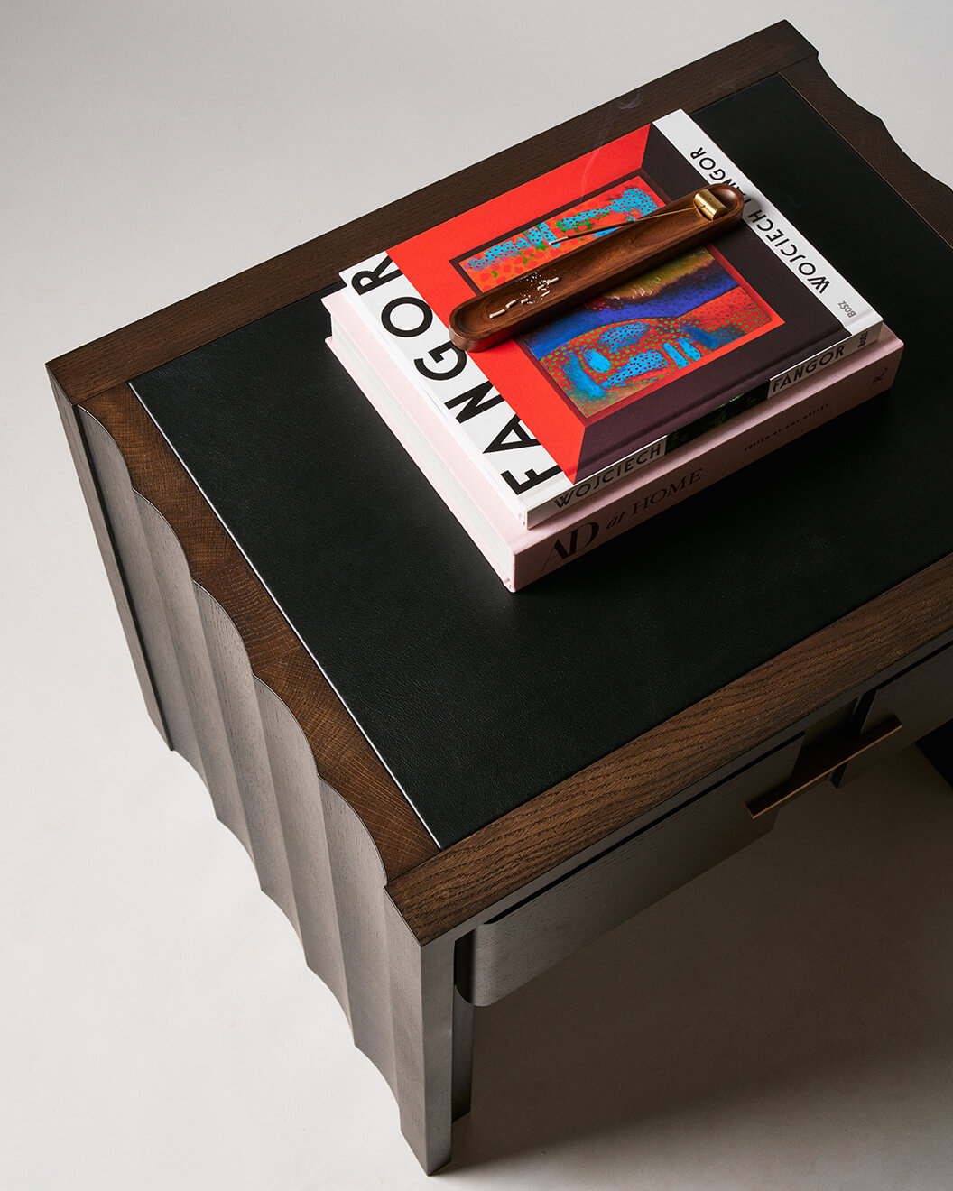 Custom solid oak nightstand with fluted detail.