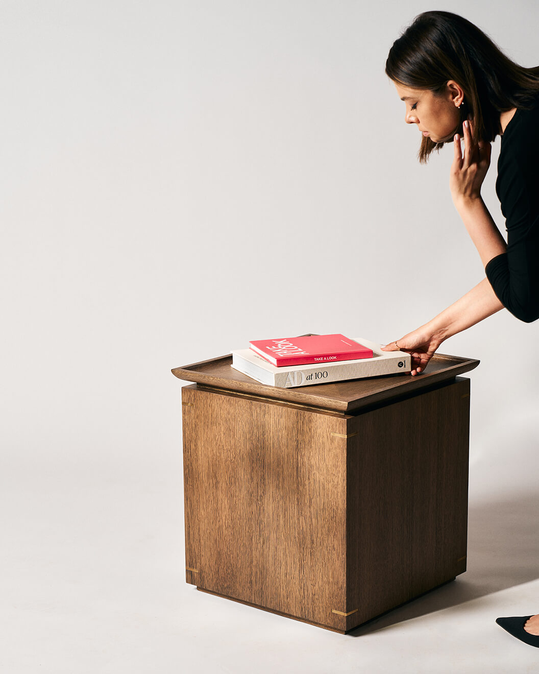 Sculptural oak side table with recessed tray top